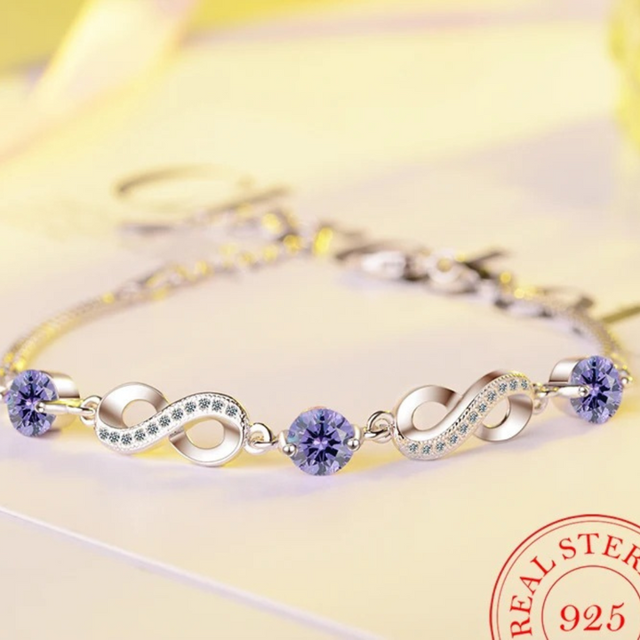 Thin infinity bracelet with beautiful zirconia stones