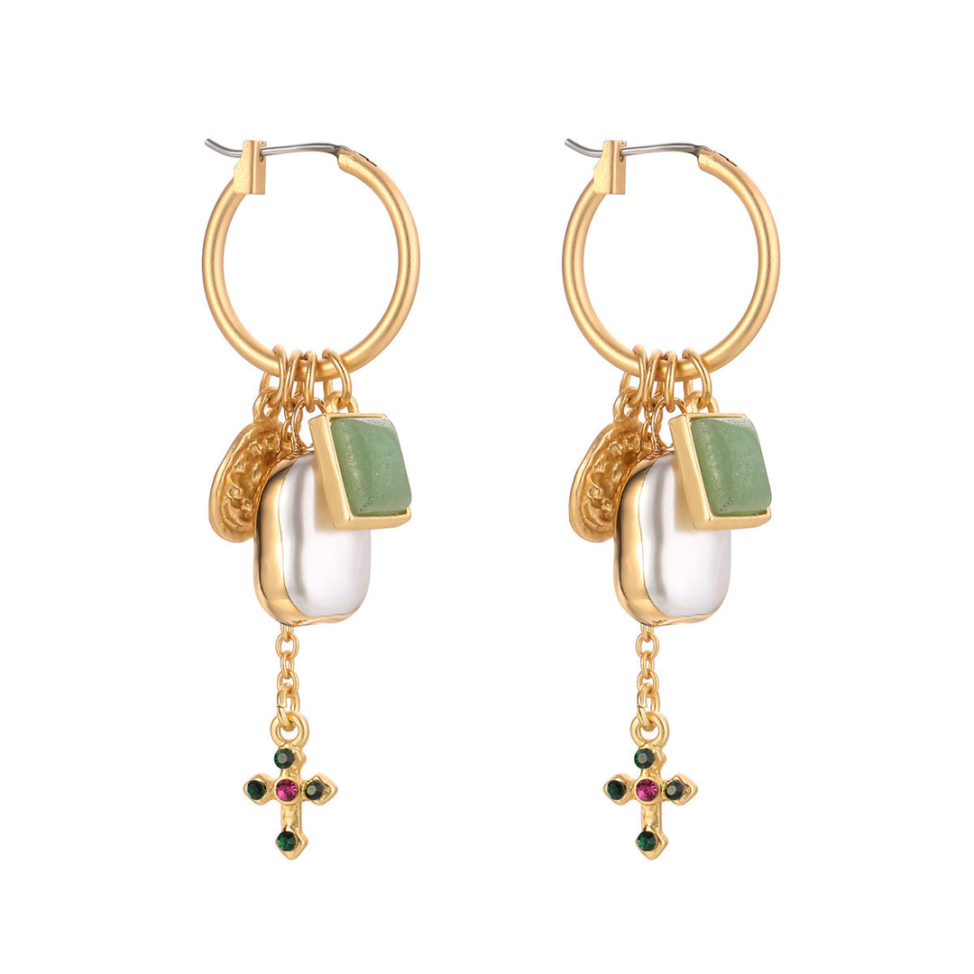 Different style pearl and gemstone earrings